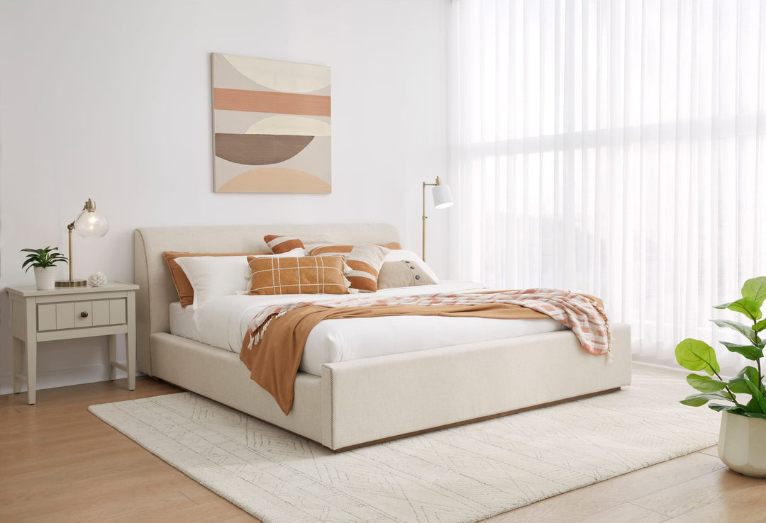 Louis Upholstered Platform Bed in Natural Linen styled in a bedroom