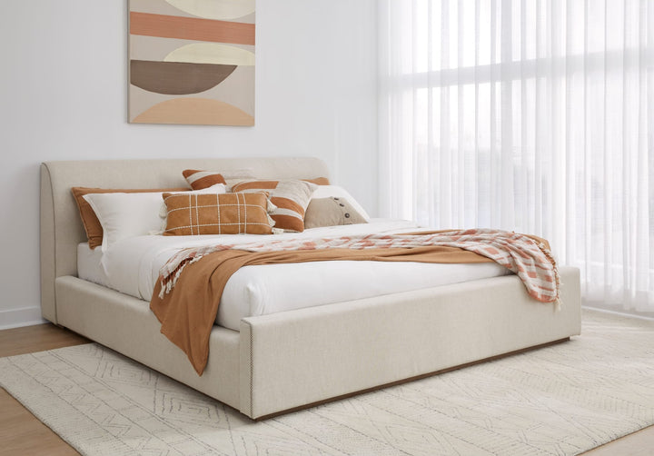 Louis Upholstered Platform Bed in Natural Linen styled in a bedroom