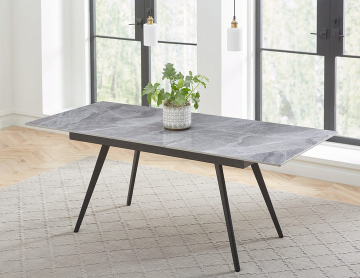 Lucia Extendable Stone Top Dining Table in Piedra and Black — lifestyle photo