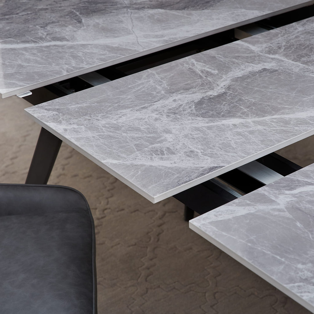 Lucia Extendable Stone Top Dining Table in Piedra and Black — lifestyle photo