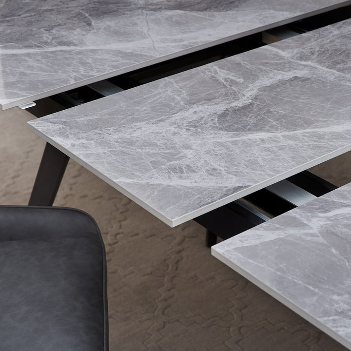 Lucia Extendable Stone Top Dining Table in Piedra and Black — lifestyle photo