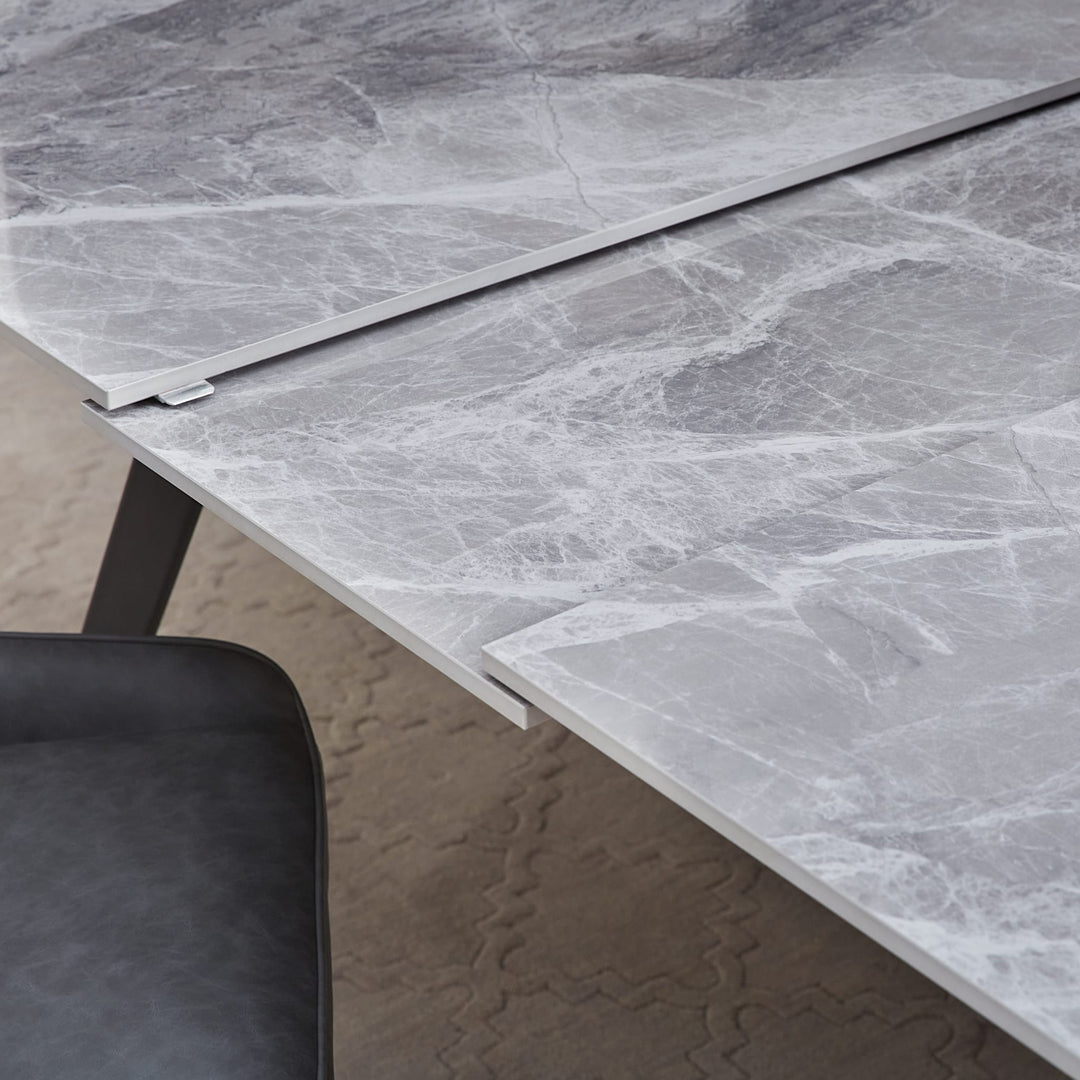 Lucia Extendable Stone Top Dining Table in Piedra and Black — lifestyle photo