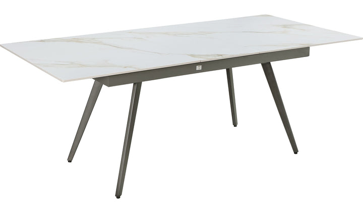 Lucia Extendable Stone Top Dining Table in Polished Cappuccino and Gunmetal — product view on a white background