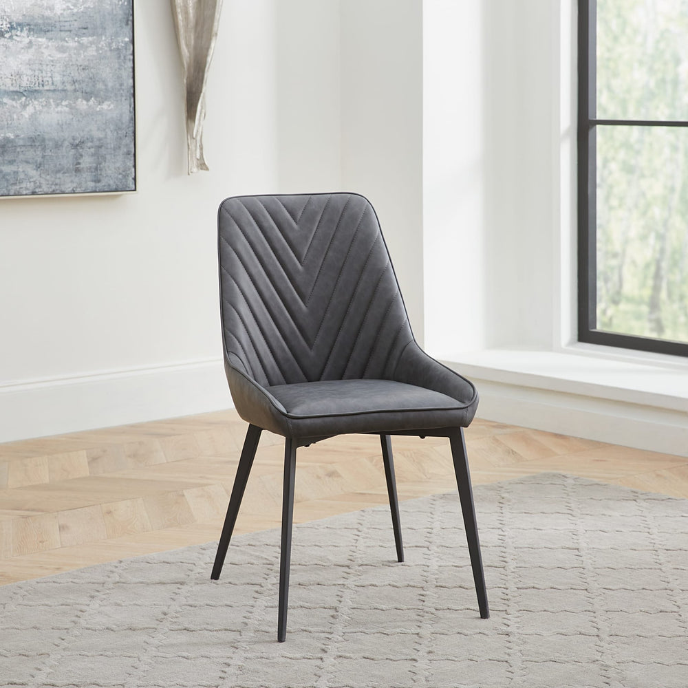 Lucia Upholstered Dining Chair in Charcoal Synthetic Leather and Black Metal — lifestyle photo