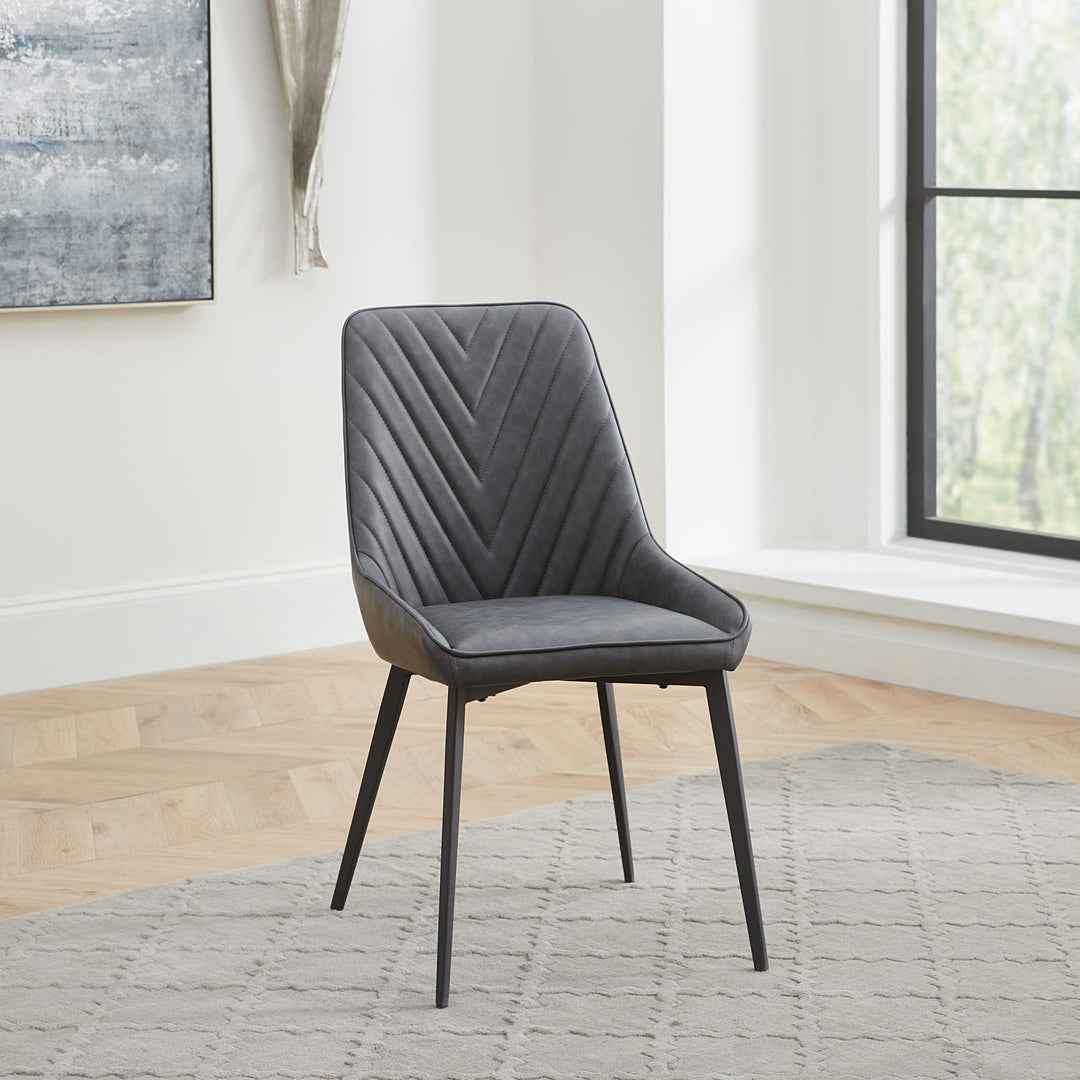 Lucia Upholstered Dining Chair in Charcoal Synthetic Leather and Black Metal — lifestyle photo