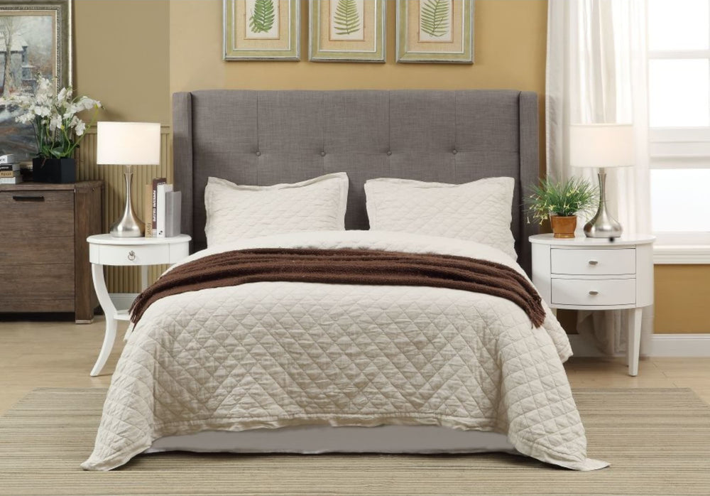 Madeleine Wingback Upholstered Platform Bed in Dolphin styled in a bedroom