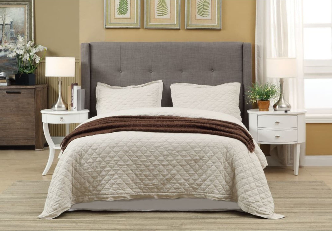 Madeleine Wingback Upholstered Platform Bed in Dolphin styled in a bedroom