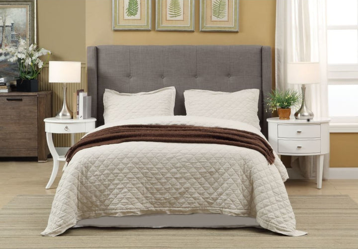 Madeleine Wingback Upholstered Platform Bed in Dolphin styled in a bedroom