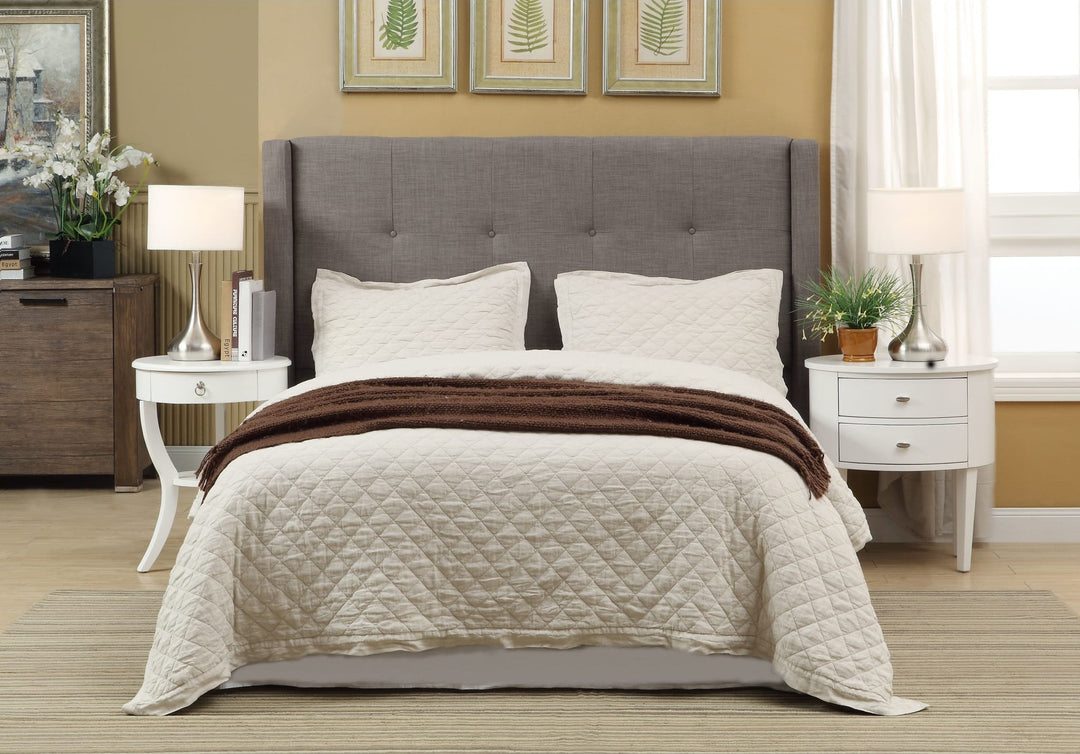Madeleine Wingback Upholstered Platform Storage Bed in Dolphin styled in a bedroom