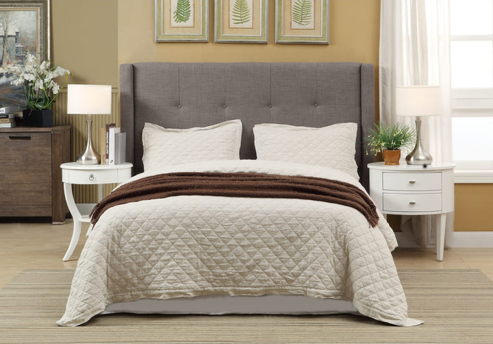 Madeleine Wingback Upholstered Platform Storage Bed in Dolphin styled in a bedroom