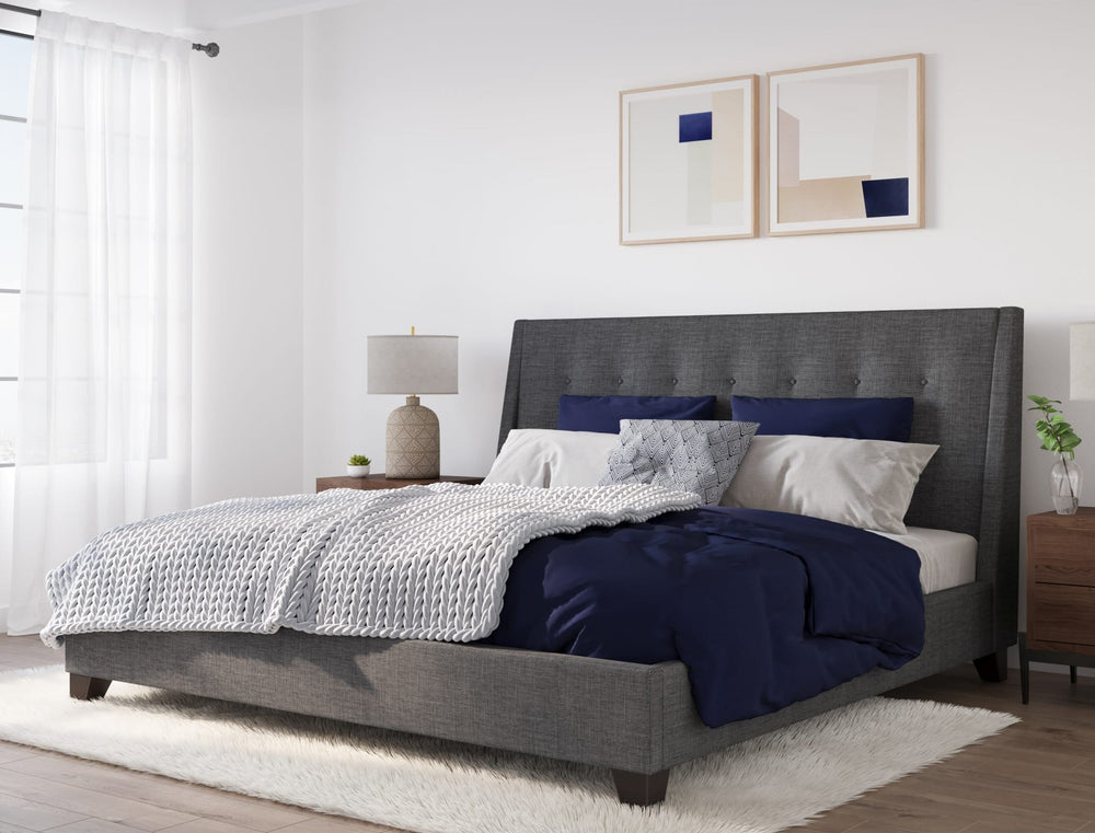 Madera Upholstered Platform Bed in Dark Charcoal styled in a bedroom