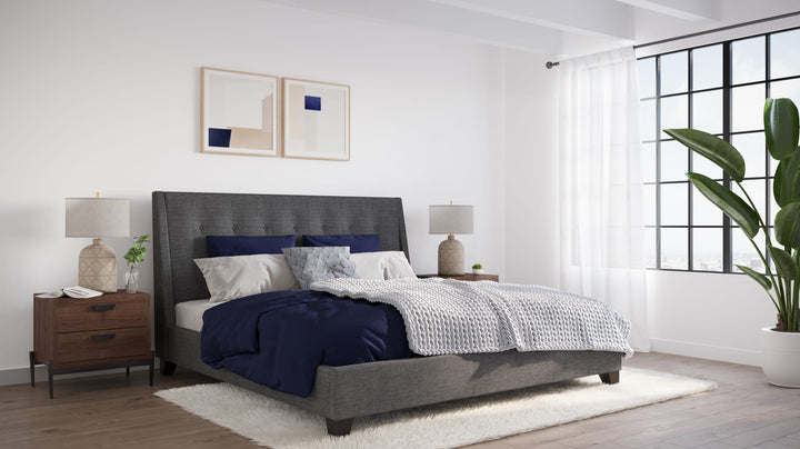 Madera Upholstered Platform Bed in Dark Charcoal styled in a bedroom