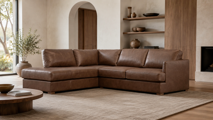 MALEA left-facing Hot Chocolate leather sectional in a modern home