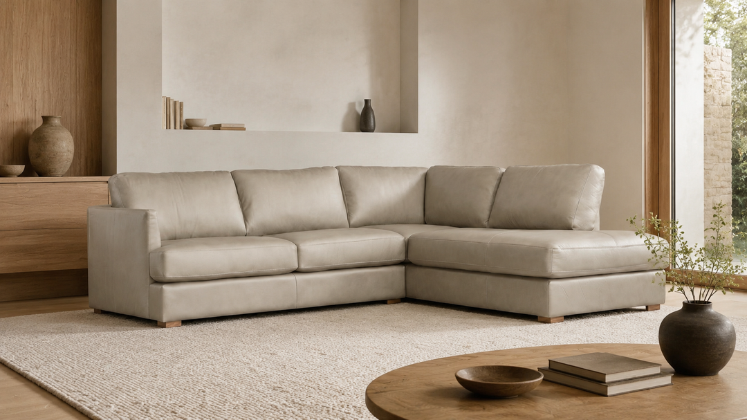 MALEA right-facing Light Stone leather sectional in a modern home