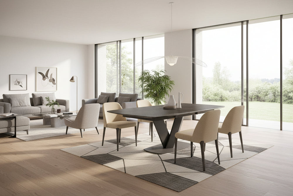 A modern rectangular dining table with a dark black marble-look top and a dark gray metal pedestal base, shown on a white background with a soft shadow.