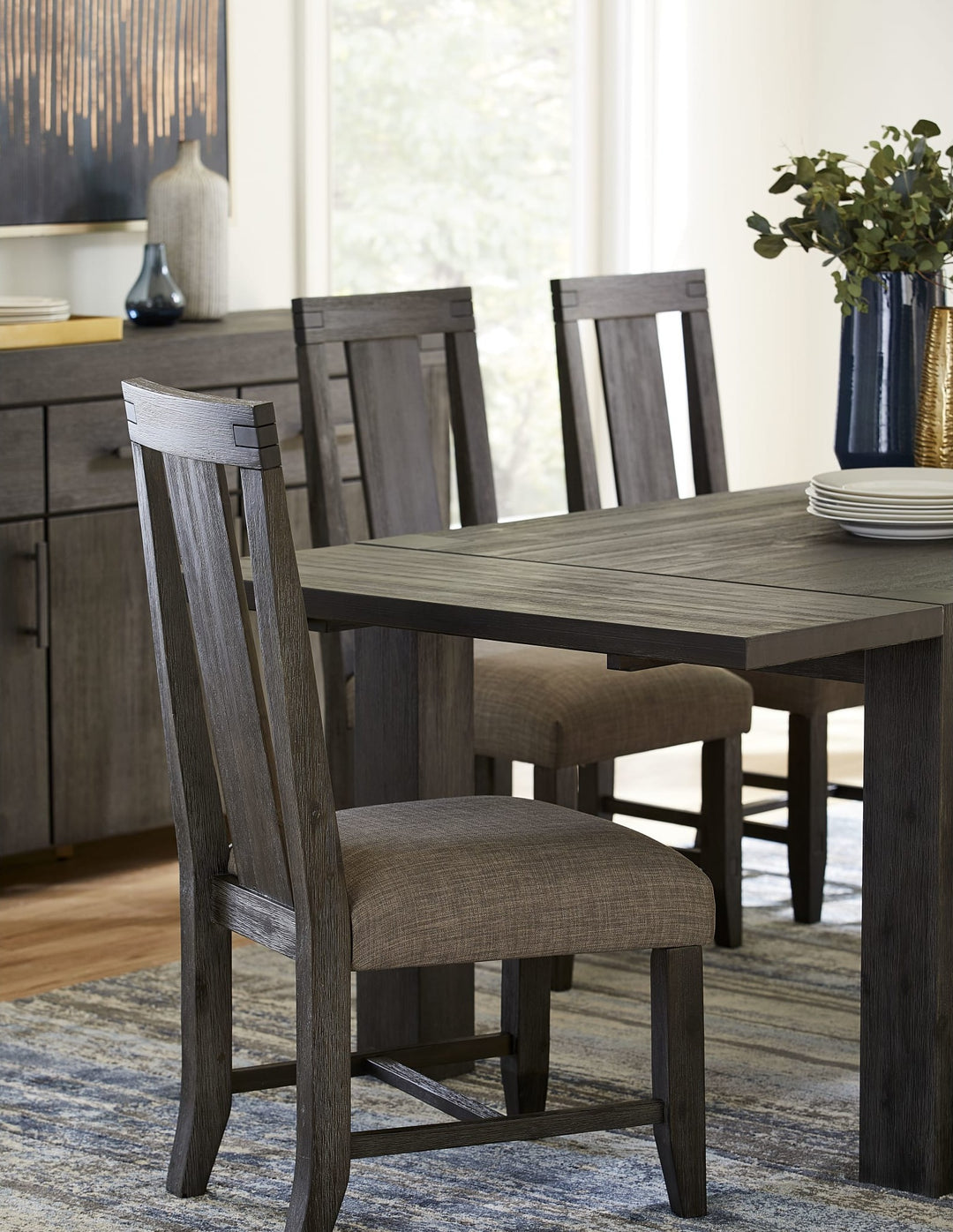 Meadow Upholstered Dining Chair in Graphite — lifestyle photo