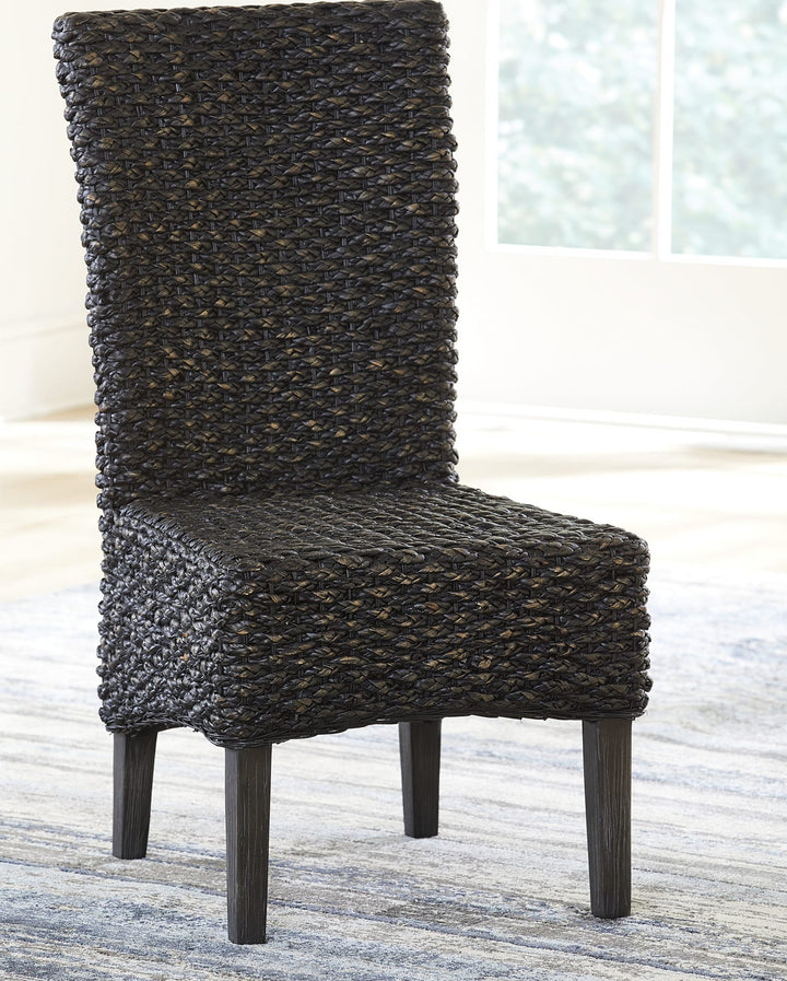 Meadow Wicker Dining Chair in Graphite — lifestyle photo
