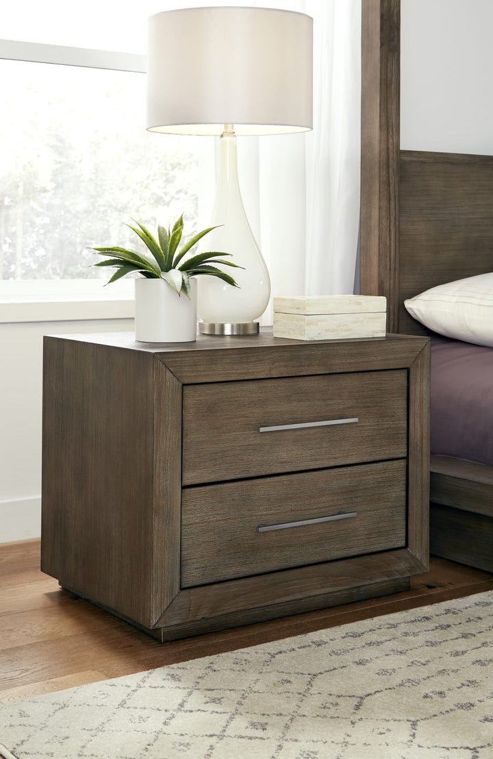 Melbourne Two Drawer Nightstand with USB in Dark Pine — in a bedroom setting