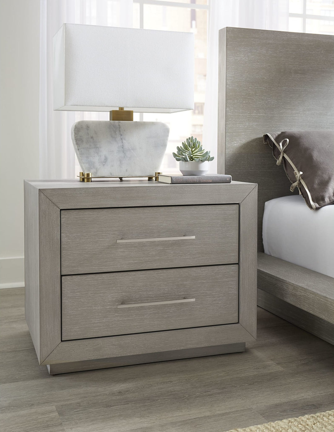 Melbourne Two Drawer Nightstand with USB in Mineral — in a bedroom setting