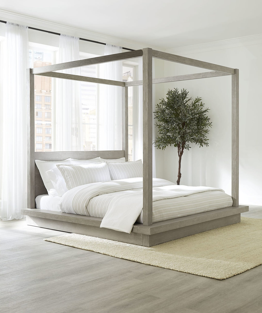 Melbourne Wood Canopy Bed in Mineral styled in a bedroom