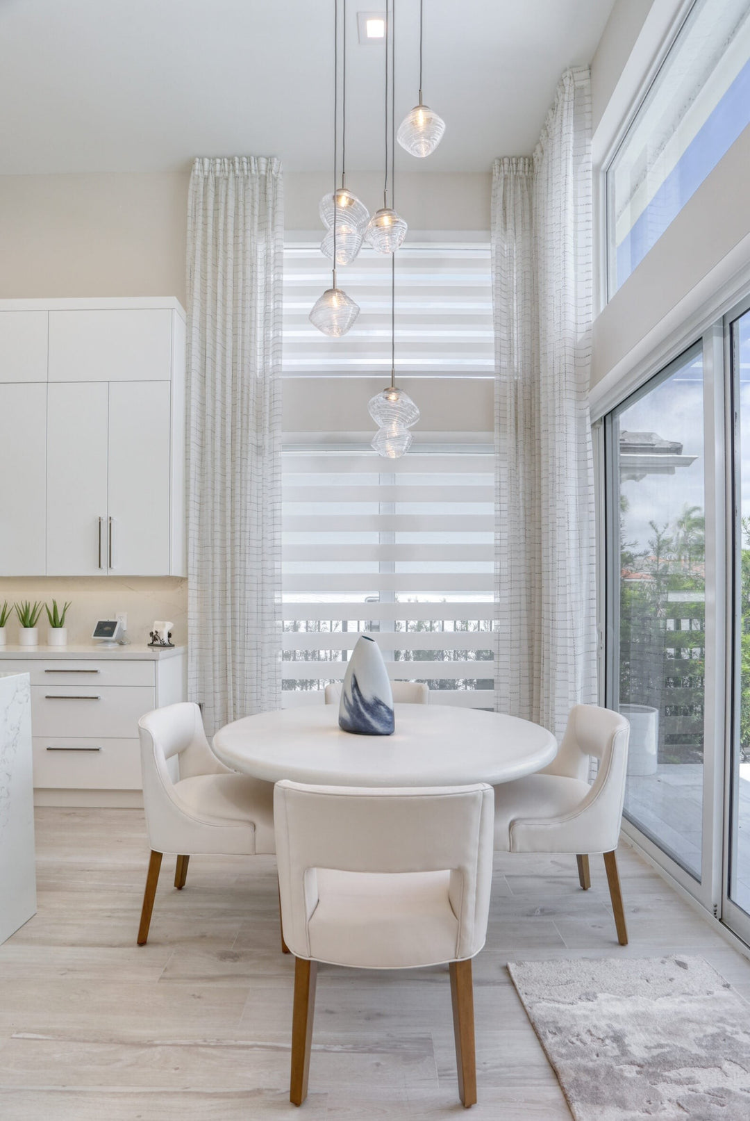 Mesa Round Pendant Chandelier by Hammerton Studio in a styled interior