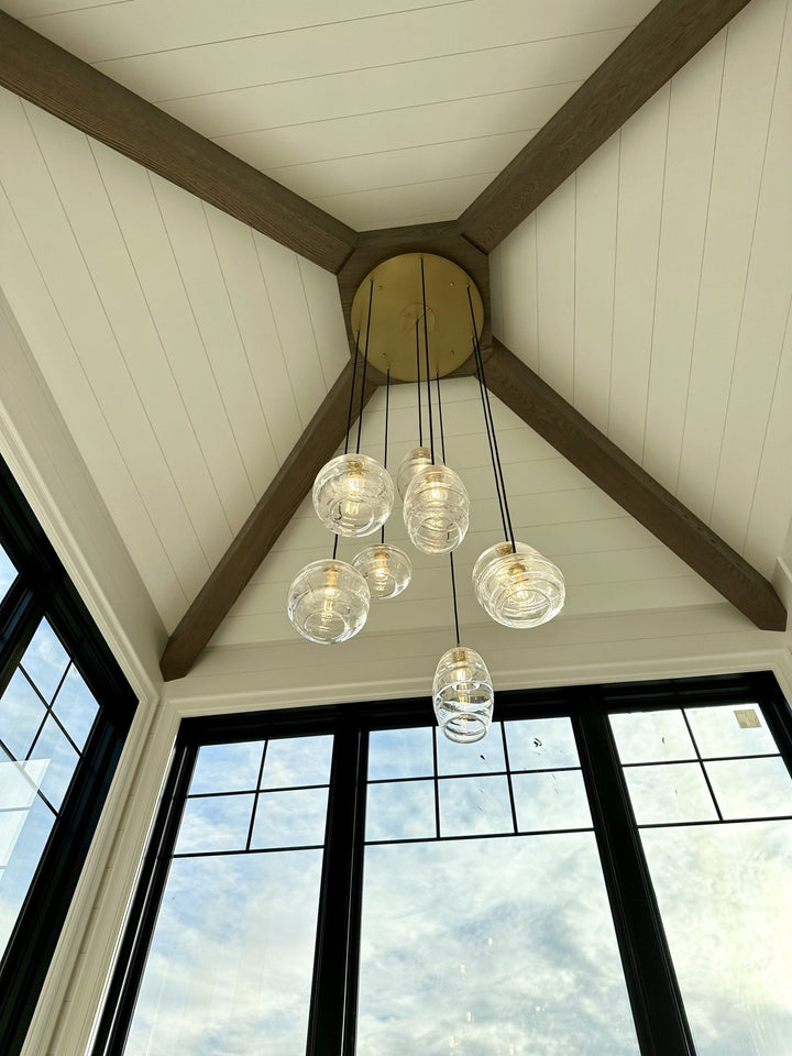 Misto Round Pendant Chandelier by Hammerton Studio in a styled interior