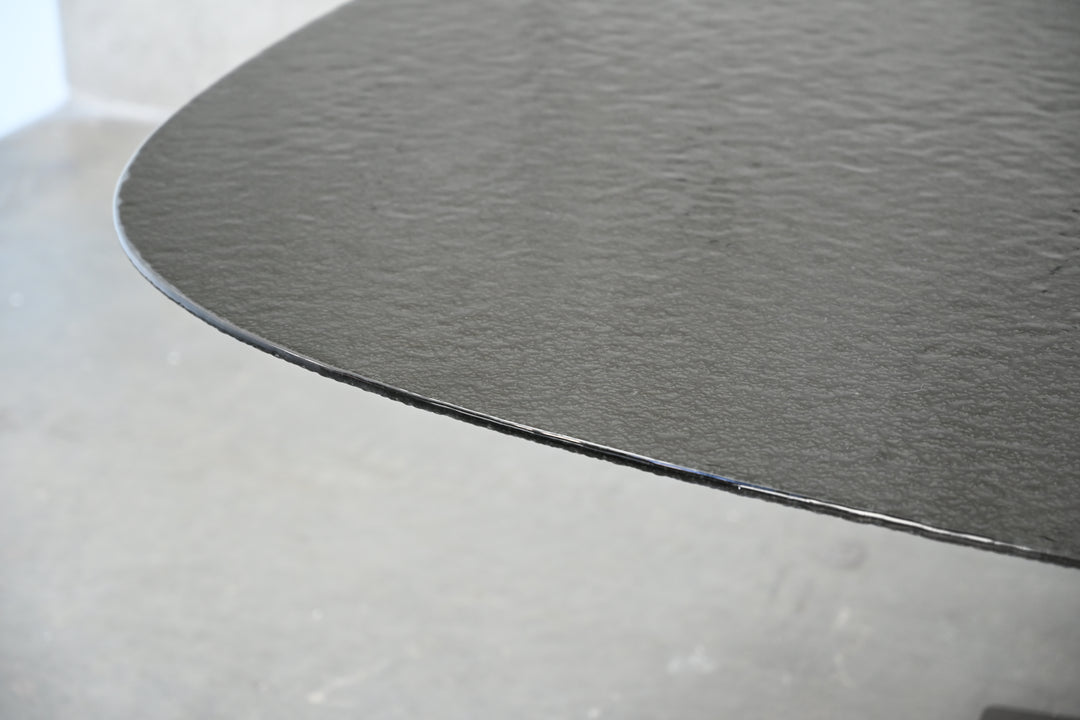 Mobital Wave 110-inch dining table in black melt glass, lifestyle view
