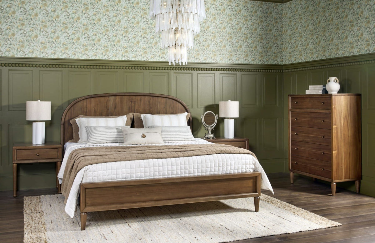Modus Langley wood bed and chest in a green-paneled bedroom