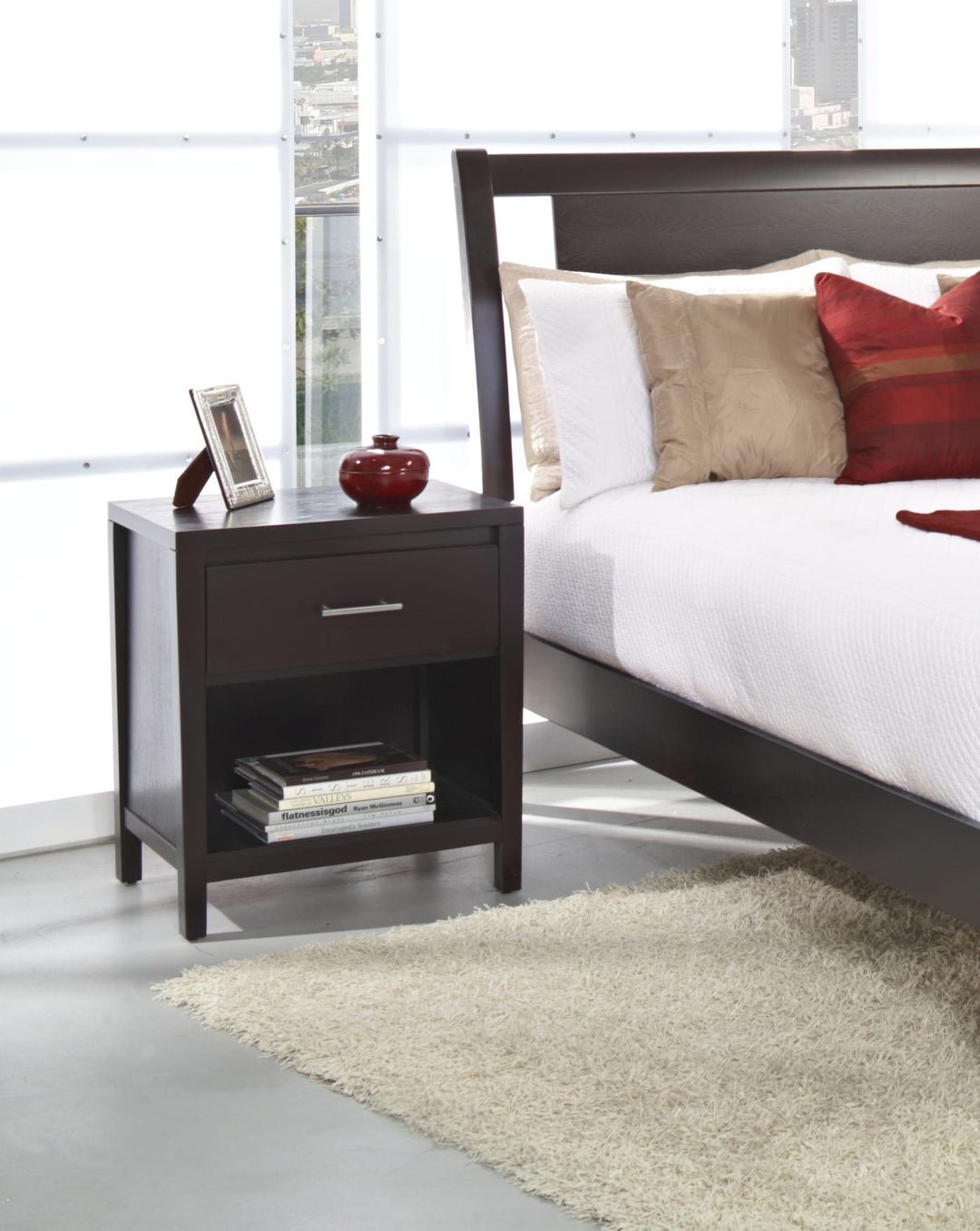 Nevis Charging Station Nightstand in Espresso — in a bedroom setting