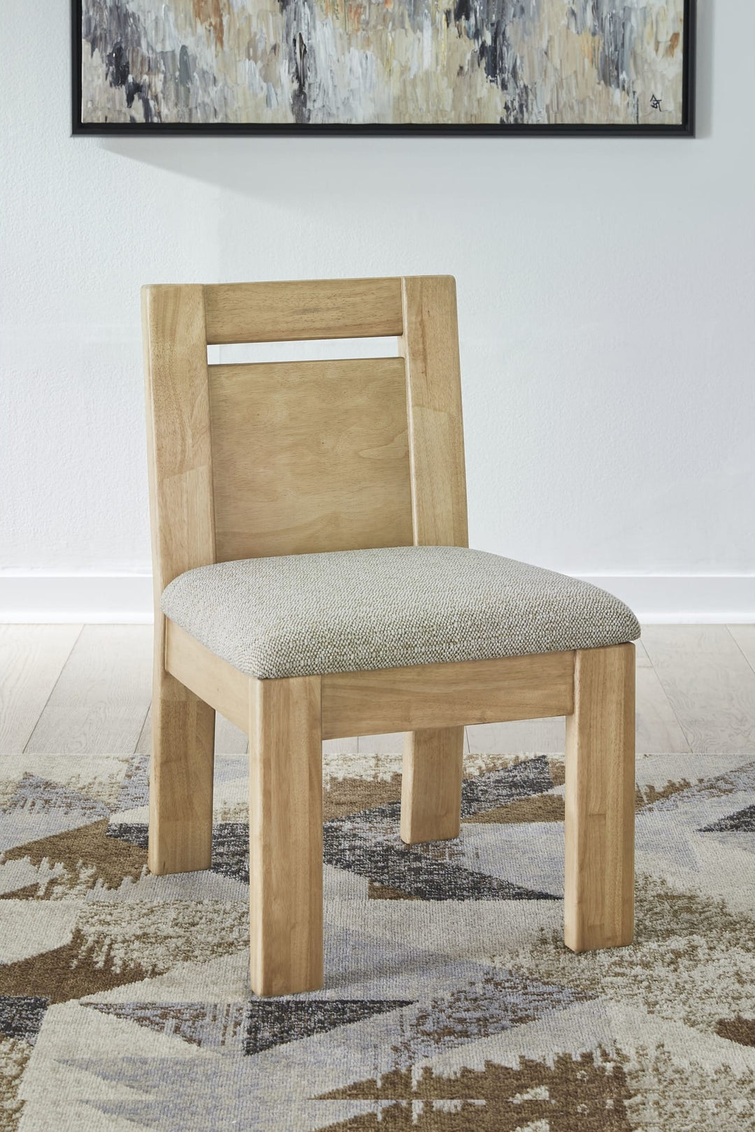 Nia Chenille Upholstered Dining Chair in Lioness and Hyena — lifestyle photo