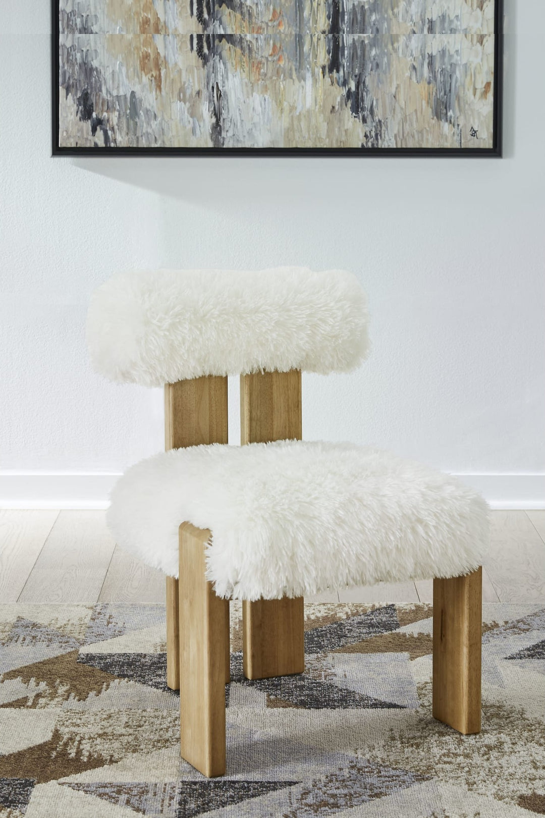 Nia Dining Accent Chair in Sheepskin and Lioness — lifestyle photo
