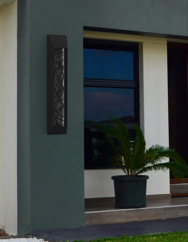 Nightfall Outdoor Sconce by Hammerton Studio in a styled interior