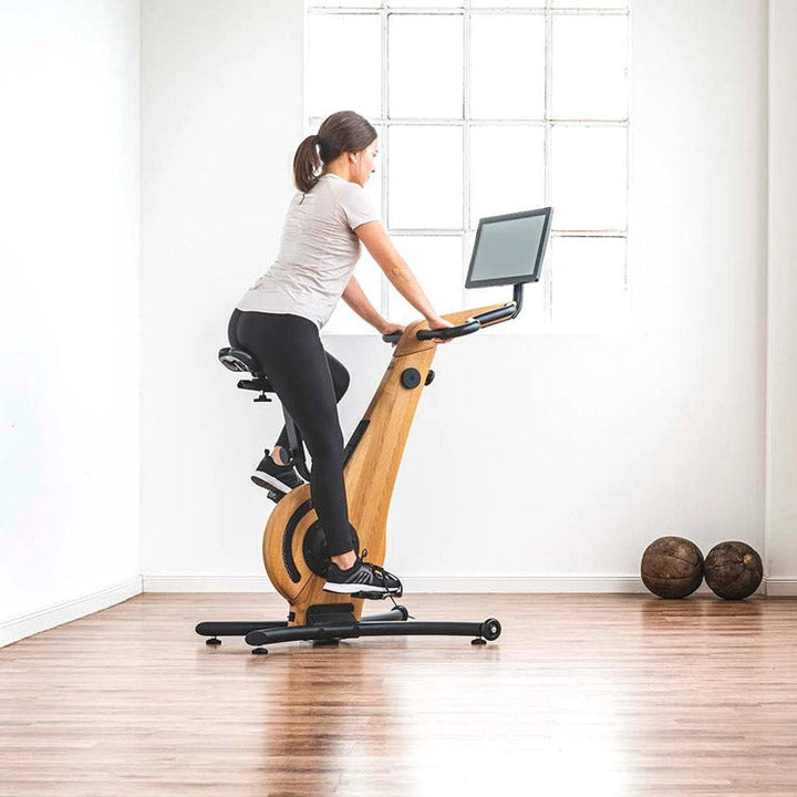NOHRD Bike PRO in a bright home fitness space