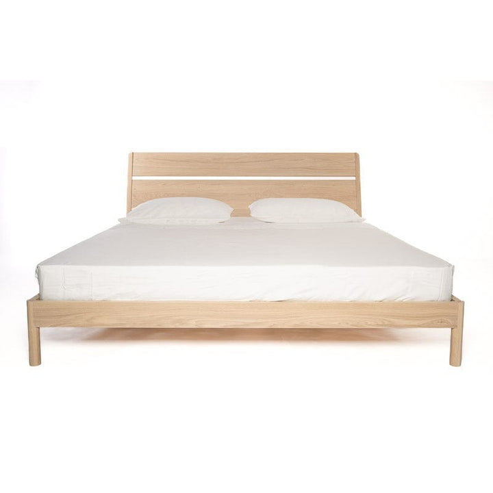 Nueva Bed — front view, white oak finish