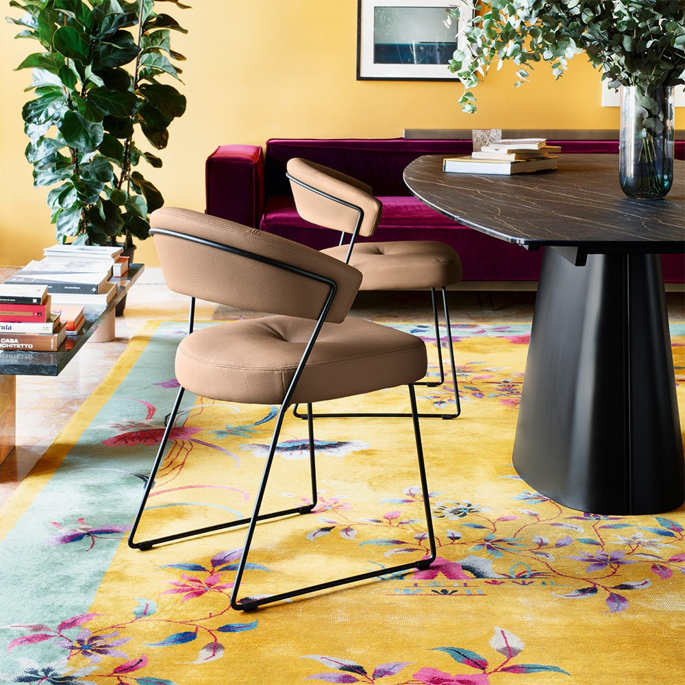 NY Anniversary Dining Armchair by Connubia in a styled interior