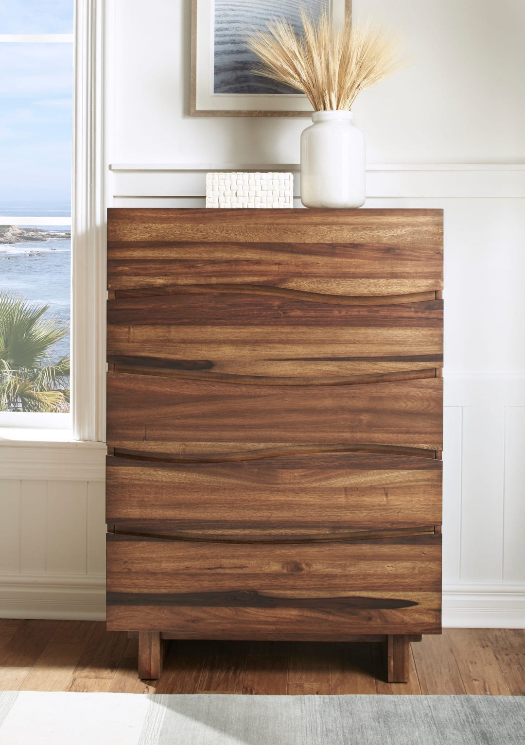 Ocean Five Drawer Solid Wood Chest in Natural Sengon — styled in a room
