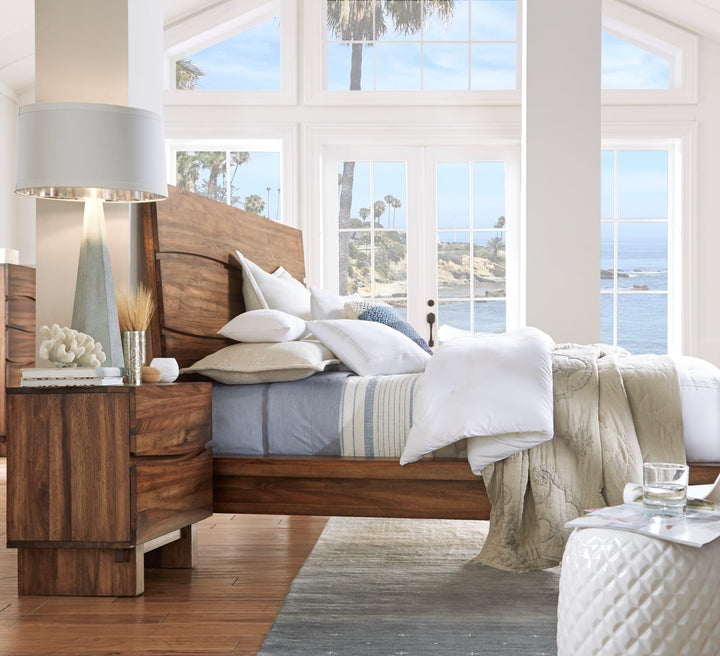Ocean Solid Wood Platform Bed in Natural Sengon styled in a bedroom