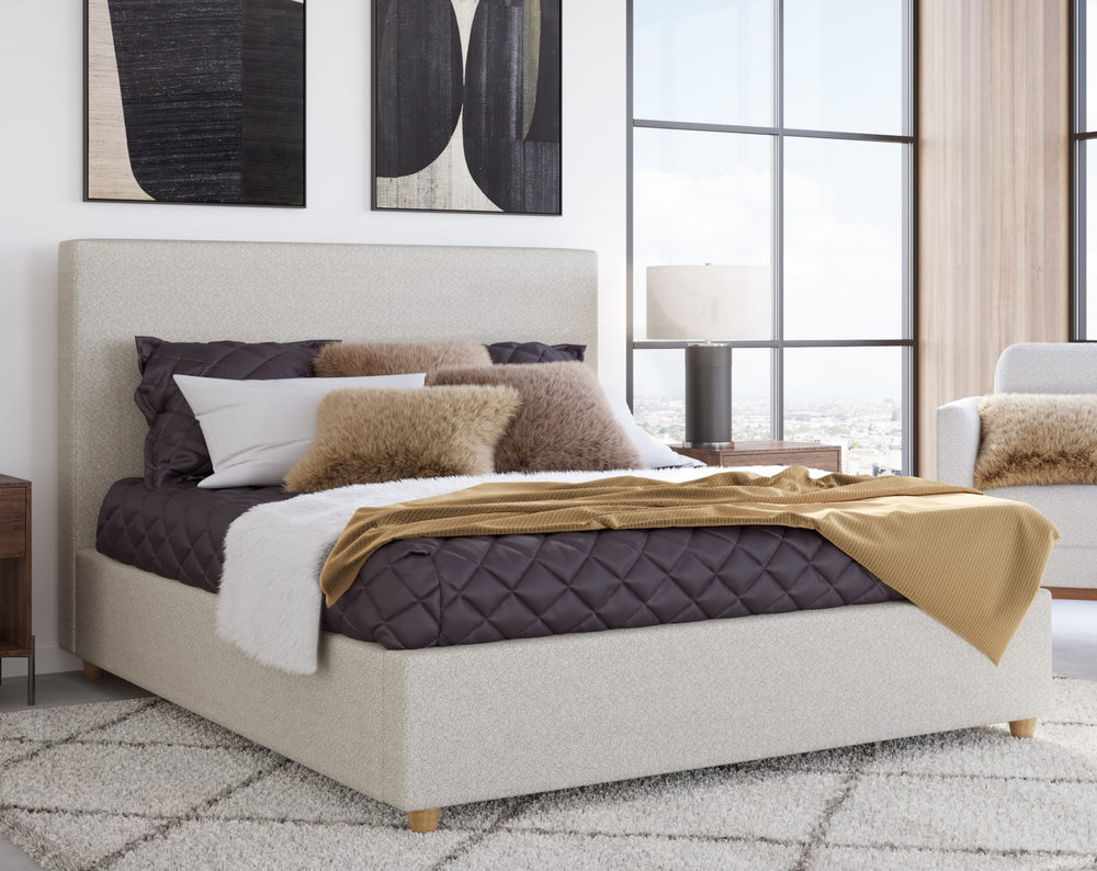 Olivia Upholstered Platform Bed in Ivory styled in a bedroom