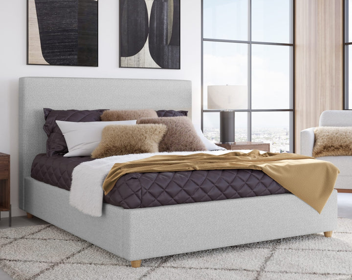 Olivia Upholstered Platform Bed in Linen styled in a bedroom