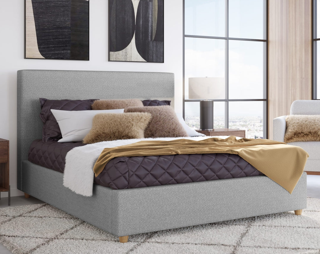 Olivia Upholstered Platform Bed in Pewter styled in a bedroom