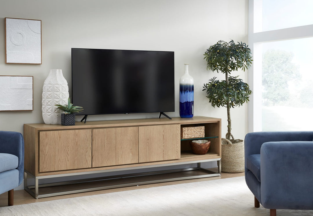 One Coastal 84" TV Console in Brushed Stainless Steel and Bisque — lifestyle photo