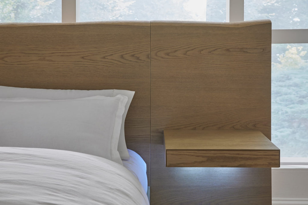 One Coastal Bed with Floating Nightstands in Bisque styled in a bedroom