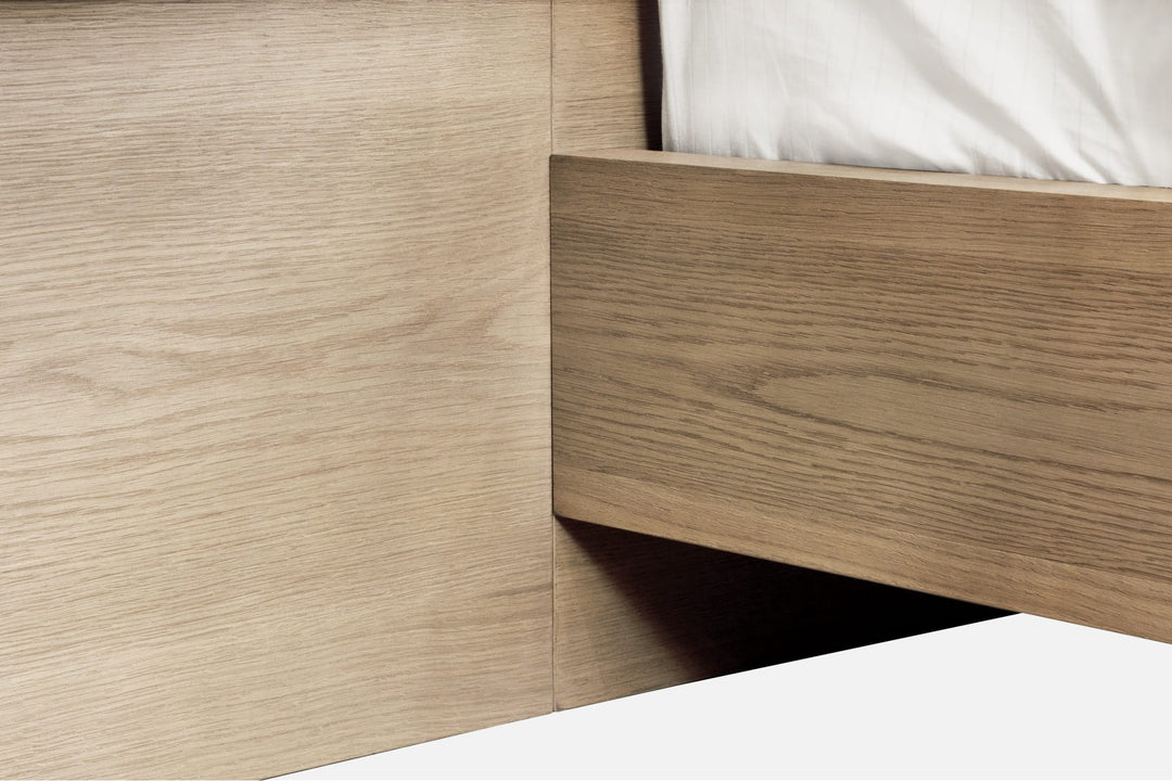 One Coastal Bed with Floating Nightstands in Bisque — close-up of the headboard panel and side rail