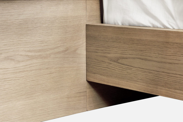 One Coastal Bed with Floating Nightstands in Bisque — close-up of the headboard panel and side rail
