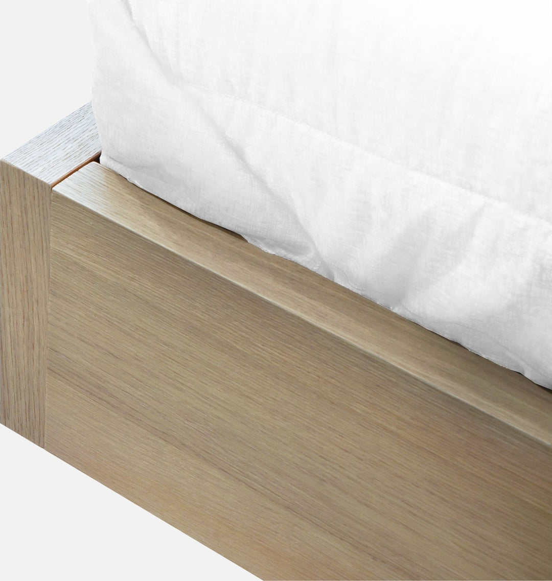 One Coastal Bed with Floating Nightstands in Bisque — close-up of the platform side rail