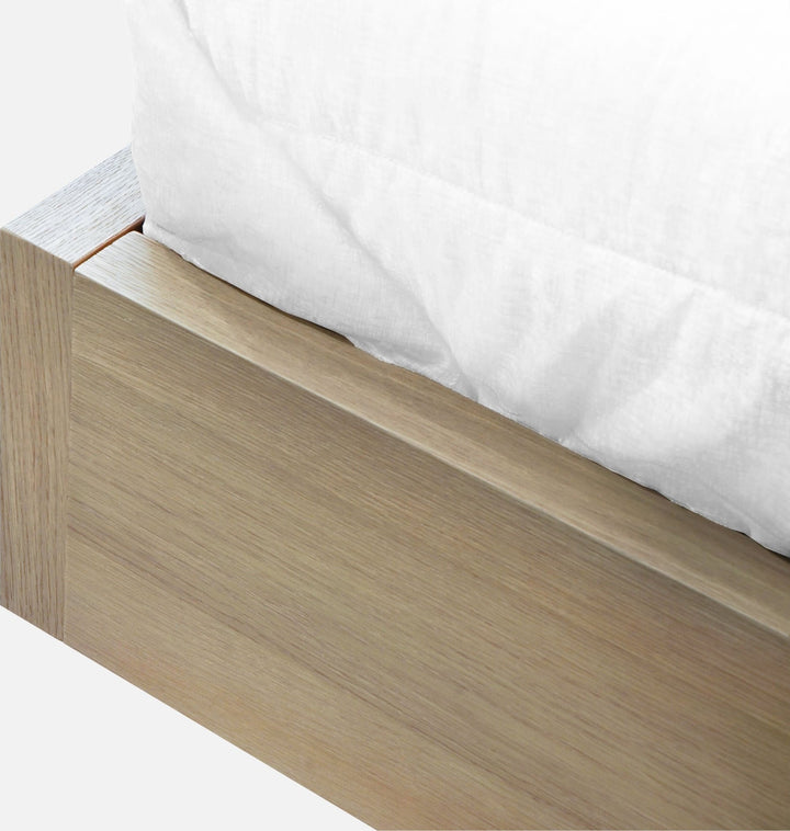 One Coastal Bed with Floating Nightstands in Bisque — close-up of the platform side rail