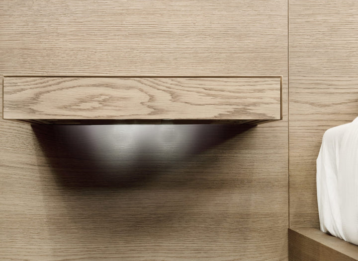 One Coastal Bed with Floating Nightstands in Bisque — close-up of a floating nightstand from the front