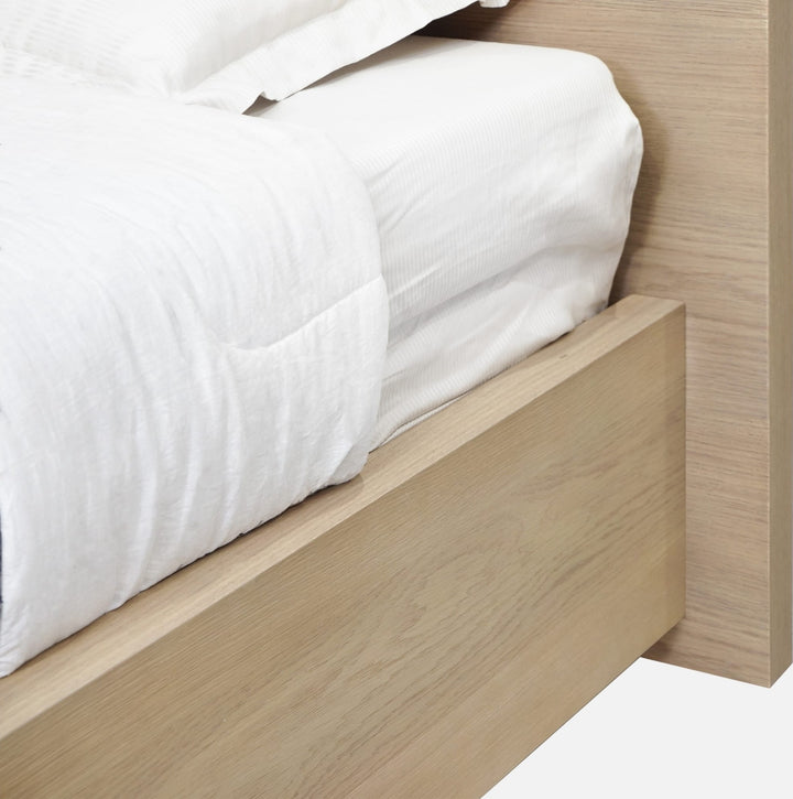 One Coastal Platform Bed in Bisque — close-up of the side rail and headboard
