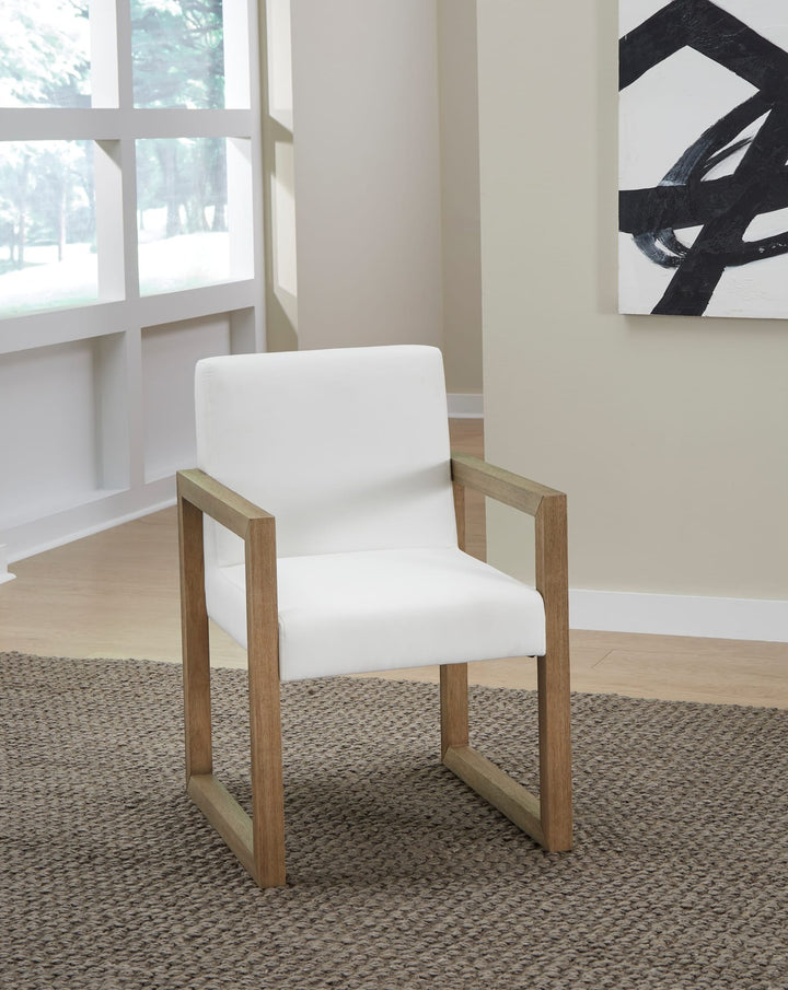 One Coastal Sled Leg Upholstered Dining Arm Chair in White Pearl and Bisque — lifestyle photo