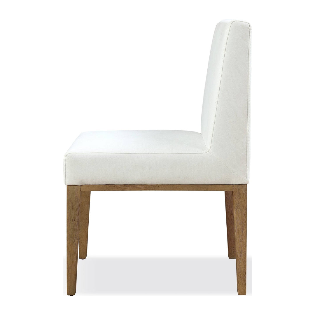 One Coastal Upholstered Dining Side Chair by Modus in White Pearl and Bisque — product view on a white background